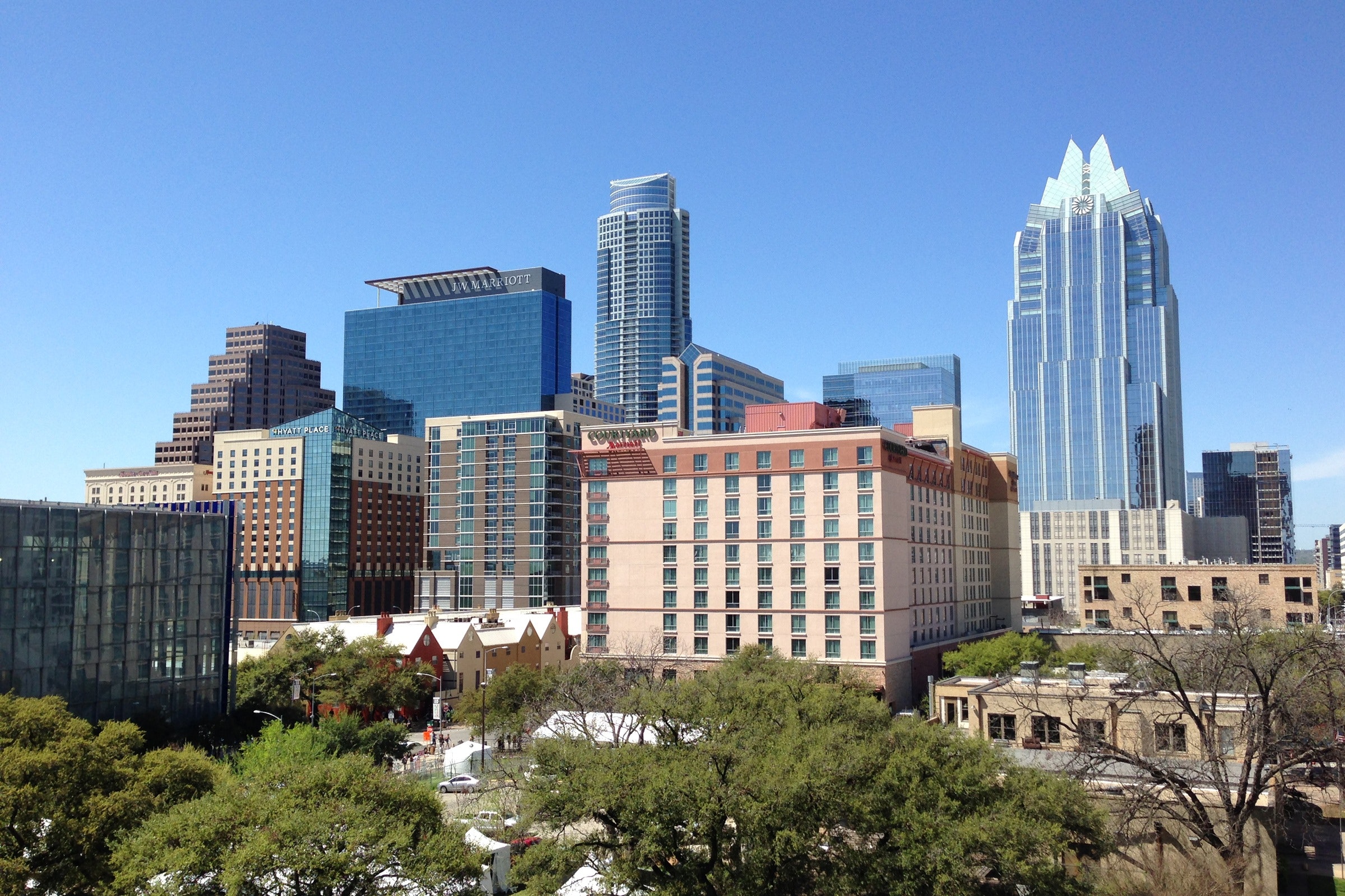 Austin, Texas skyline on a clear blue sky day.